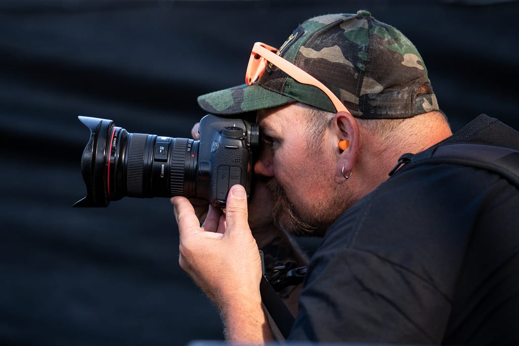 Photographer Colin Smith, captured in action by Dean Kalyan.